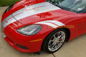 Red C6 Corvette convertible with metallic silver grand sport fender hash marks stripes