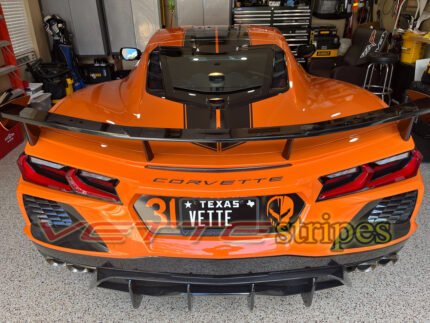 Amplified orange C8 Corvette coupe with rear plate blackout