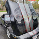 Black C4 Corvette convertible with AE stripes in shark gray and red