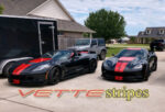 Black C7 Z06 Corvette with GM full length dual racing ME stripes in red