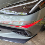 Hypersonic gray C8 Corvette Stingray with torch red fangs