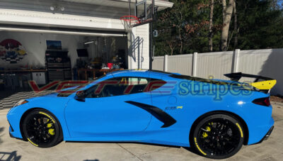 Rapid blue C8 coupe with carbon flash and strike yellow IMSA C8R stripes