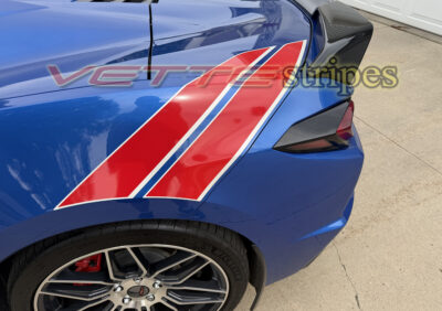Riptide blue C8 Corvette Stingray with grand sport heritage rear fender hash stripes in gloss red and satin pearl white