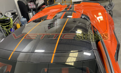 Sebring Orange C8 Corvette Eray with gloss carbon flash and amplified orange full length dual racing stripes