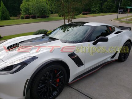 White C7 Z06 with carbon flash center stripes and C7R2 jake option