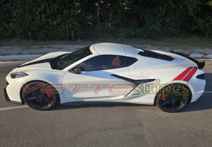 White C8 Corvette Eray with rear Grand Sport fender hash stripes on gloss red and gloss carbon flash
