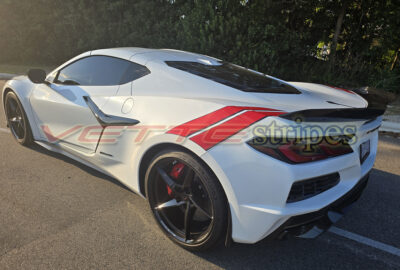 White C8 Corvette Eray with rear Grand Sport fender hash stripes on gloss red and gloss carbon flash