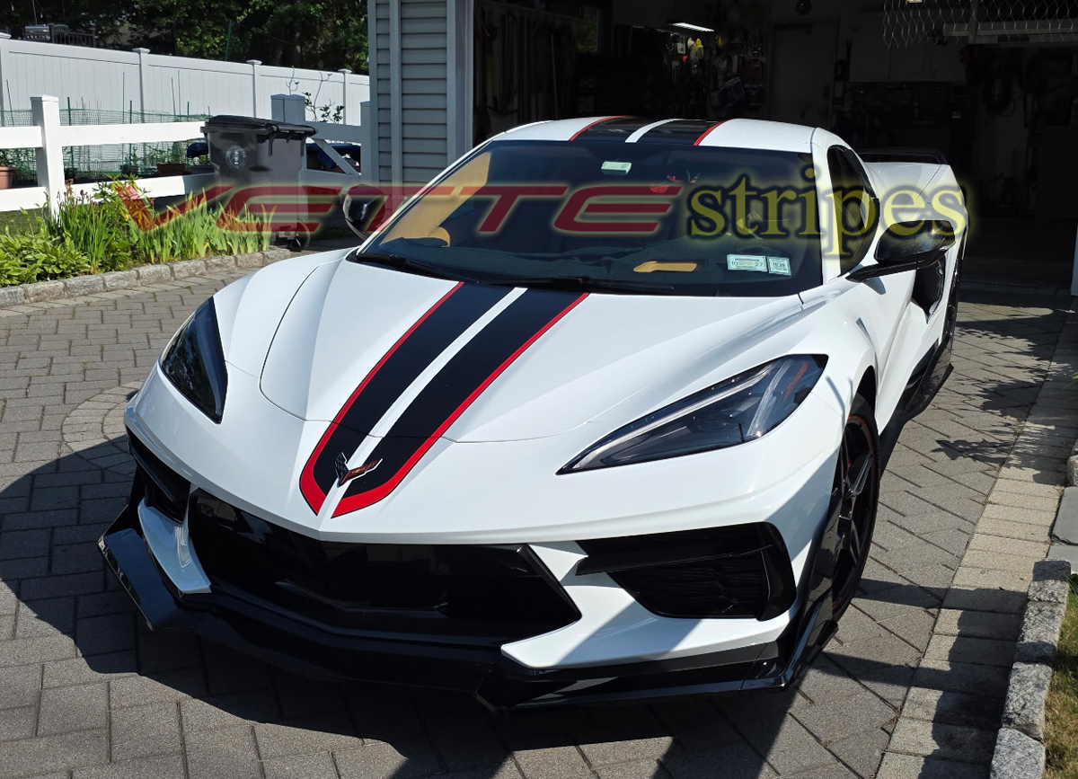 White C8 Corvette Stingray with GM full length dual racing stripes in carbon flash and red White C8 Corvette Stingray with GM full length dual racing stripes in carbon flash and red