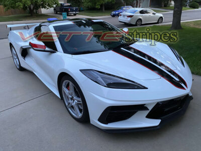 White C8 Corvette coupe with 2024 full length dual racing stripes in gloss carbon flash and gloss adrenaline red