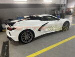 White C8 Corvette with 2024 full length dual racing stripes in Texas Longhorn orange