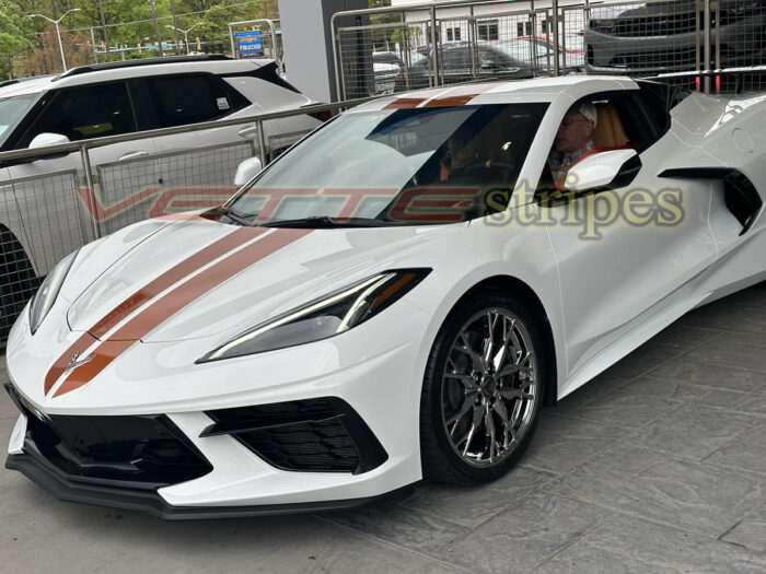 White C8 Corvette with 2024 full length dual racing stripes in Texas Longhorn orange