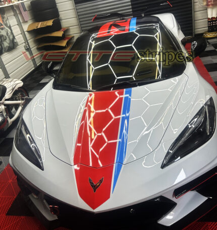 White C8 corvette Stingray vert with cardinal red and rapid blue racing stripes