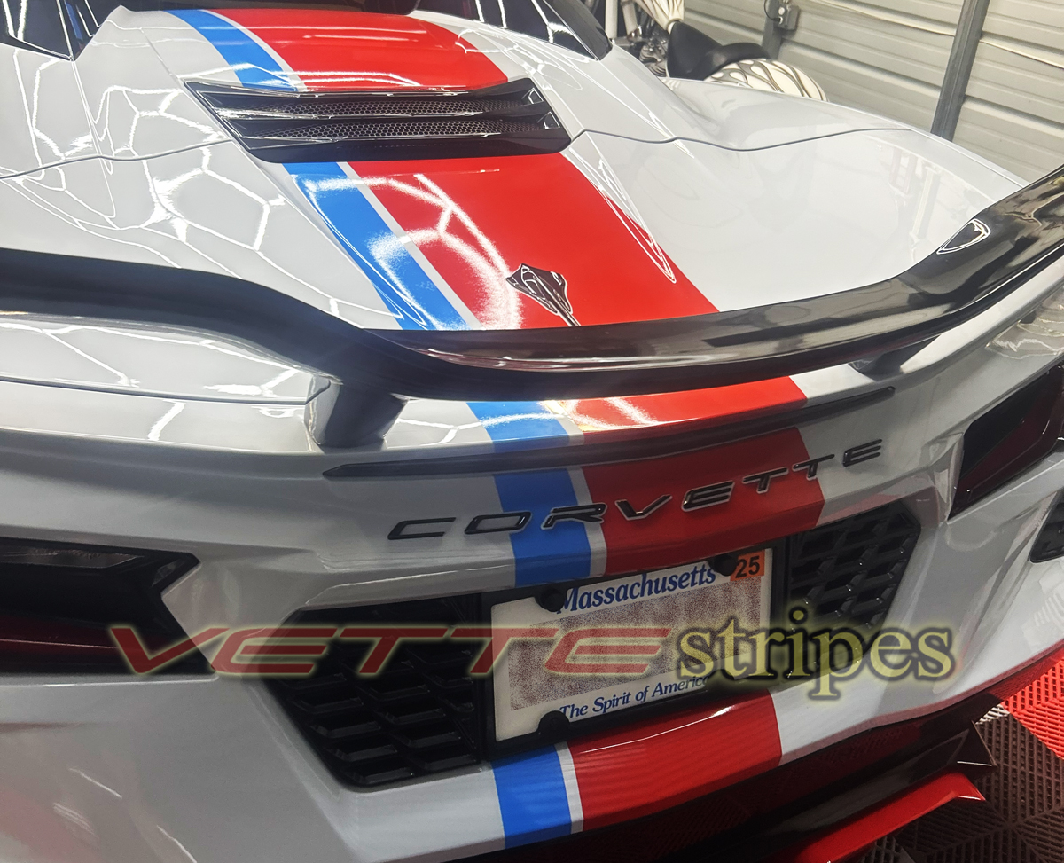 White C8 corvette Stingray vert with cardinal red and rapid blue racing stripes White C8 corvette Stingray vert with cardinal red and rapid blue racing stripes