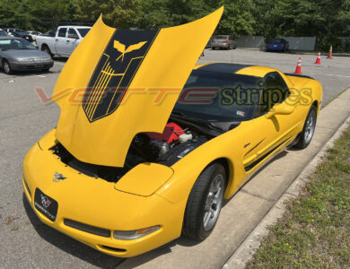 Yellow C5 Corvette Z06 with matte black and gloss black GT5 stripes