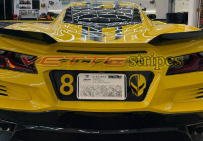 Yellow C8 Corvette Z06 Eray with rear plate blackout